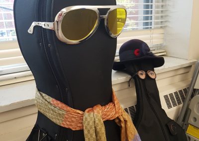Cello case with sunglasses on them