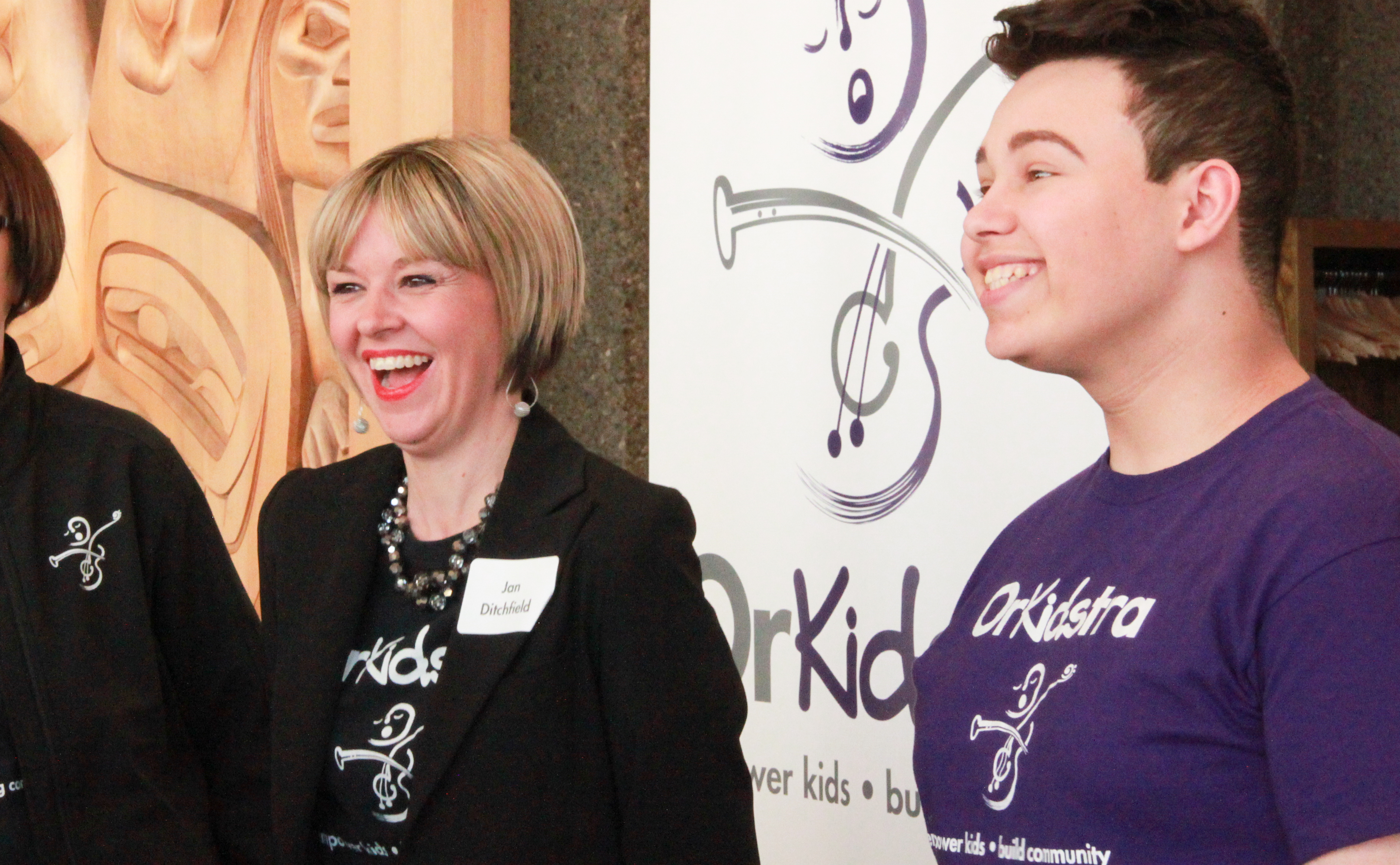 A photo of Jan Ditchfield with OrKidstra graduate Amar. Photo by Fei Wu.